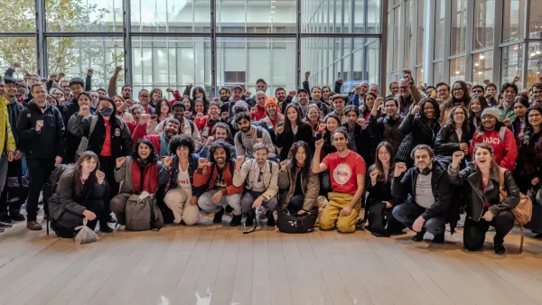 CWA members at the New York Times tech unit with fists up for a picture